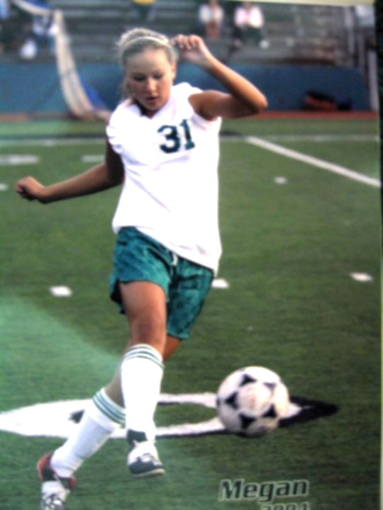 Megan in her youth playing soccer